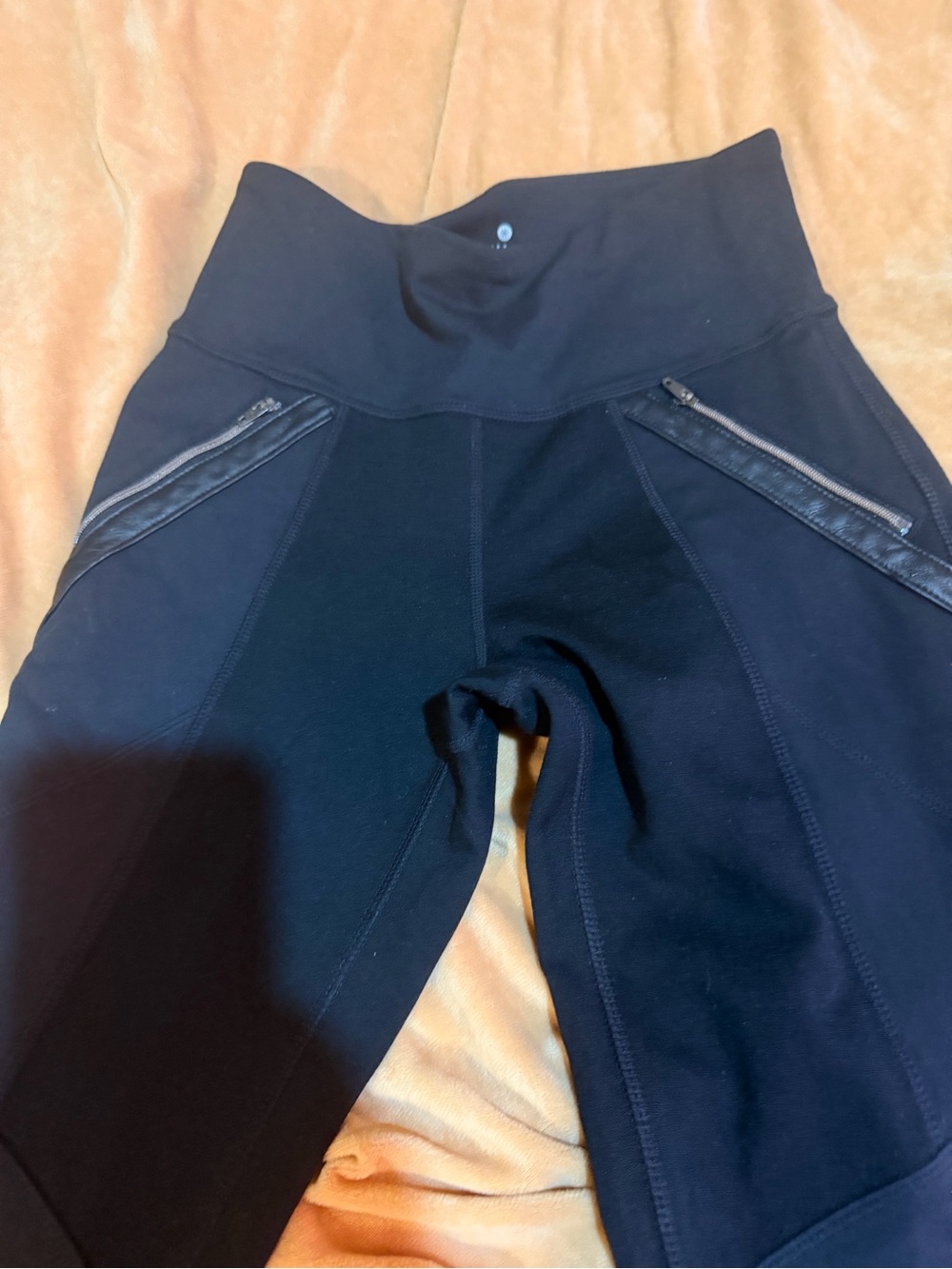 Athleta Black High-Rise Performance Leggings with Zip Pockets